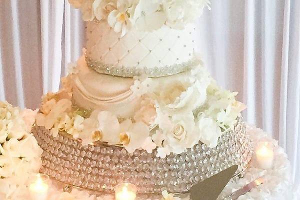 White wedding cake with flowers