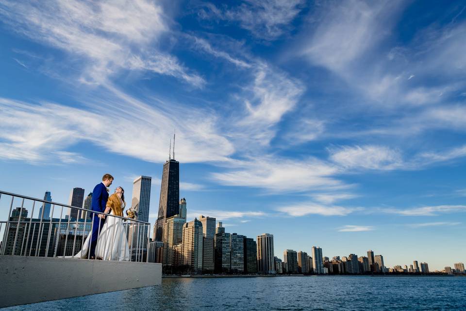 Bride & groom with skyline