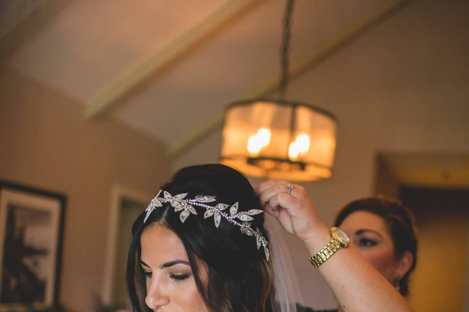 Assisting the bride with her veil | Photography by Anna Mae Photo, Venue Hyatt Lake Tahoe, Incline Village, Makeup and Hair by La Di Da Beauty