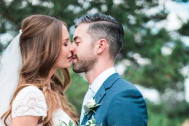 Bride and groom kissing