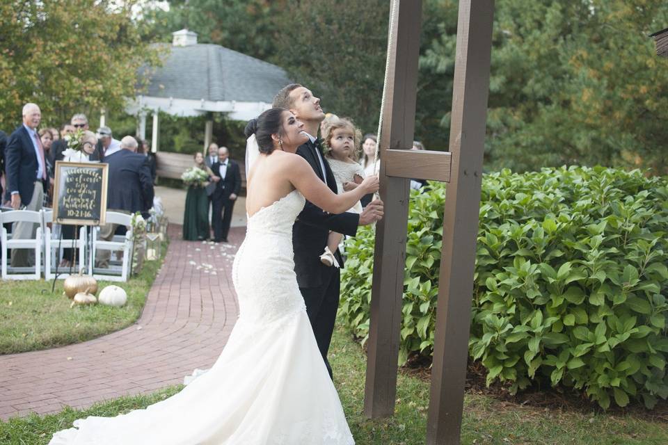 The couple ringing the bell