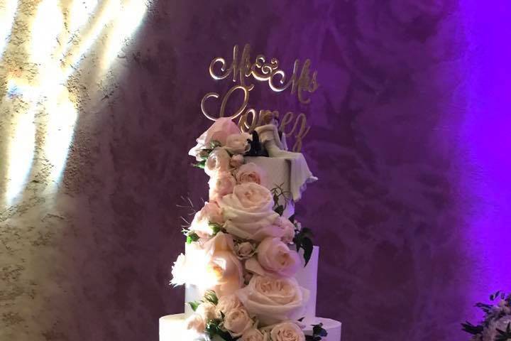 White wedding cake with flowers