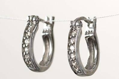 Baby Pave Hoop Earrings
Each and every pave crystal is hand set on sterling silver hoops. Inner diameter: 0.5