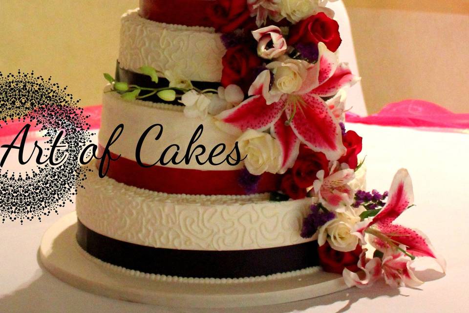 Tall cake with cascading flowers