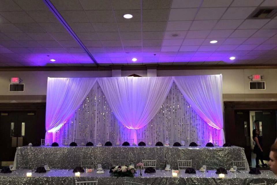 Head table backdrop with up lighting.