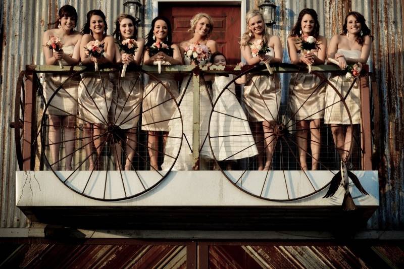 Bride and bridesmaids on the balcony