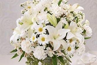Elegant vase of lillies and other great flowers