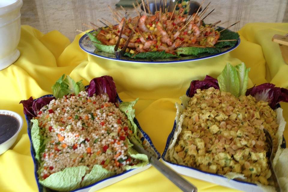 chilled displays of Quinoa salad, island curried chicken salad and key lime shrimp skewers