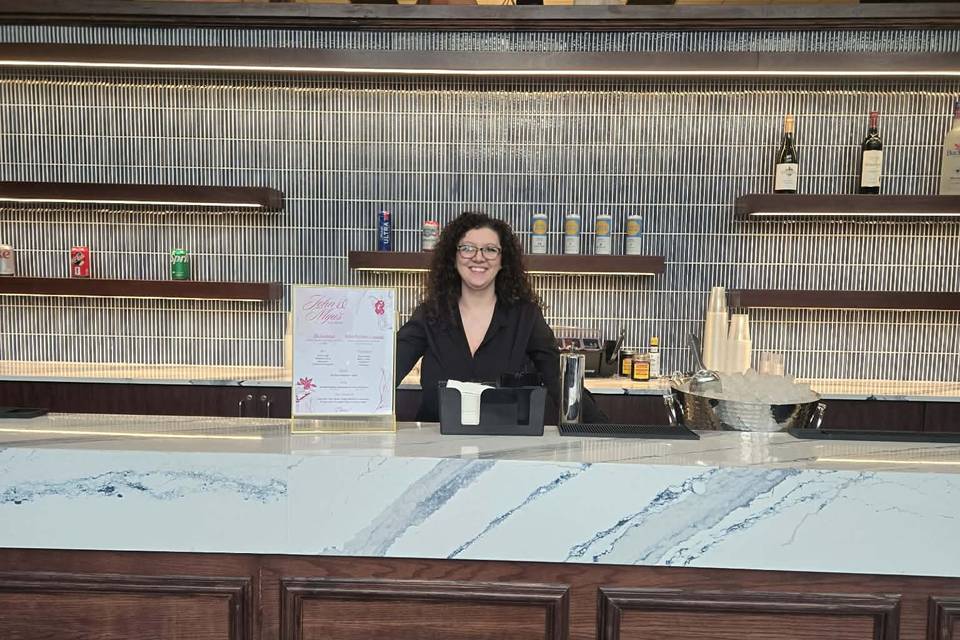 Brianna behind bar