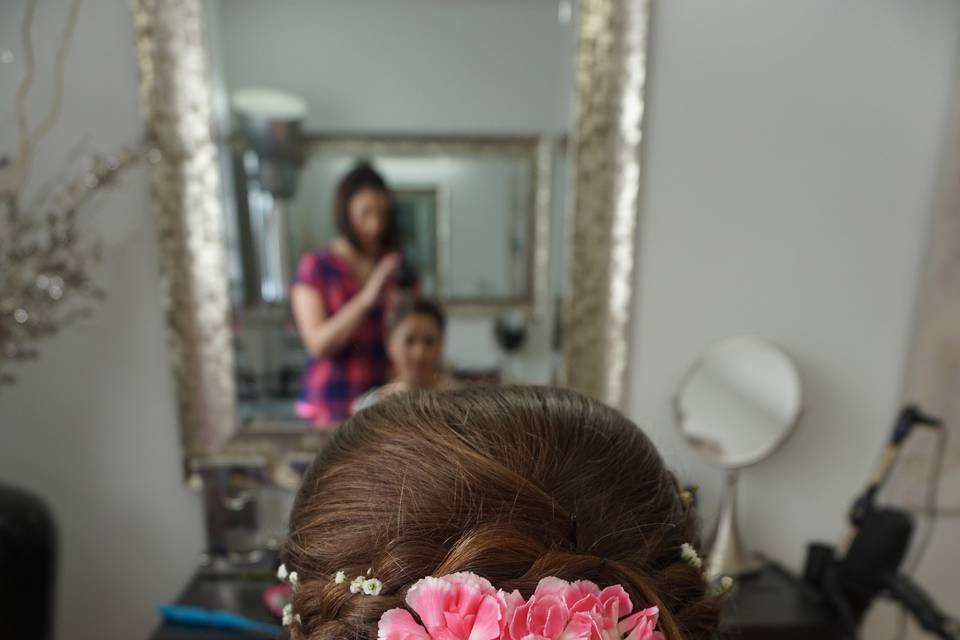 Updo with pink flowers