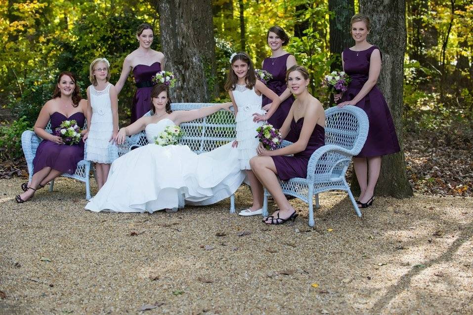 Bride, bridesmaids, and flower girl