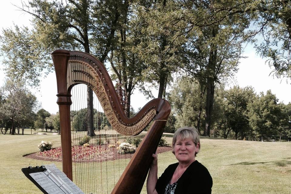 Debbie Beck and her harp