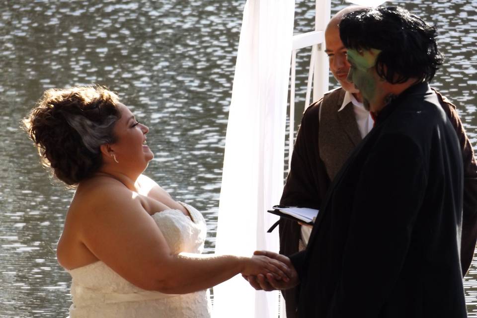 A costume wedding by the water