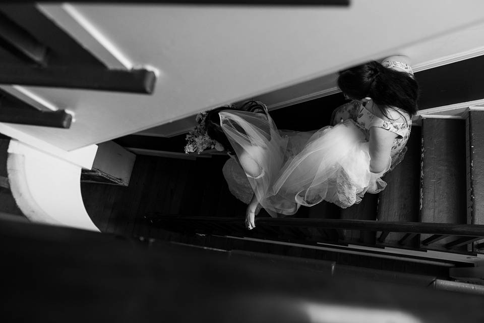 Bride walking down Staircase