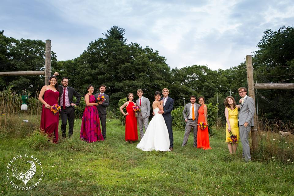 Wedding party in front of the new orchard