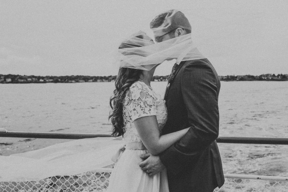 A bride and groom after their wedding on the Casco Bay ferry