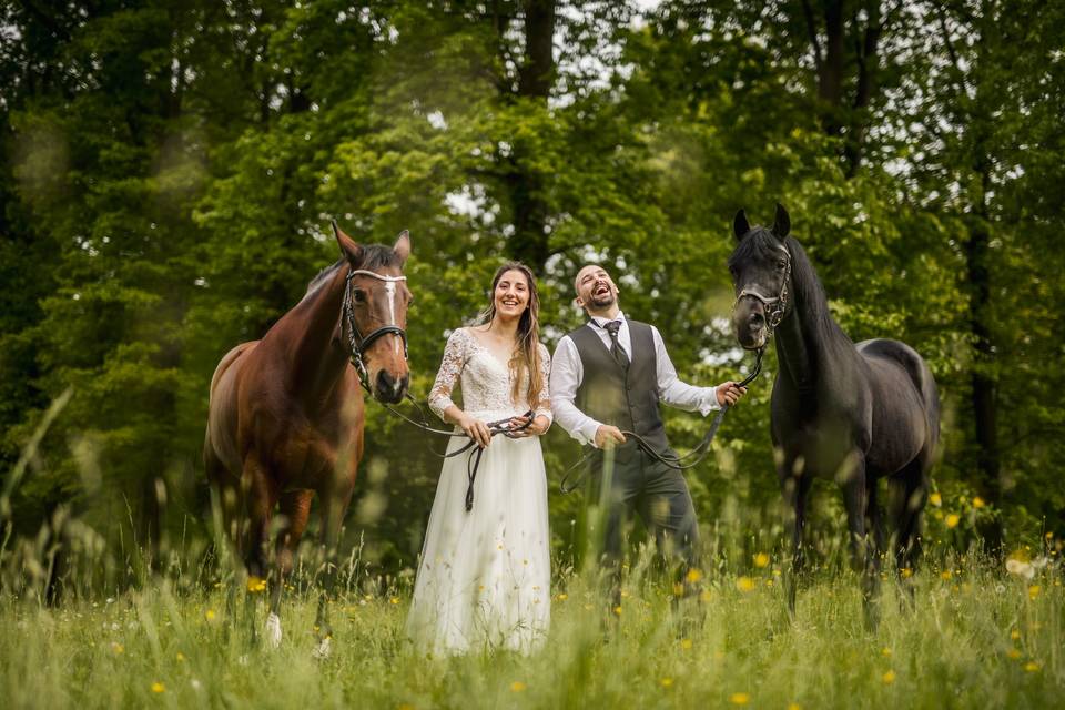 Newlyweds with their horses