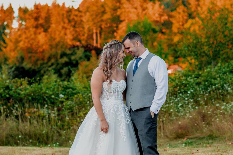 Couple in the Field at Sunset