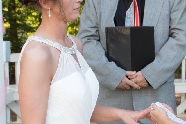 Bride receiving her ring