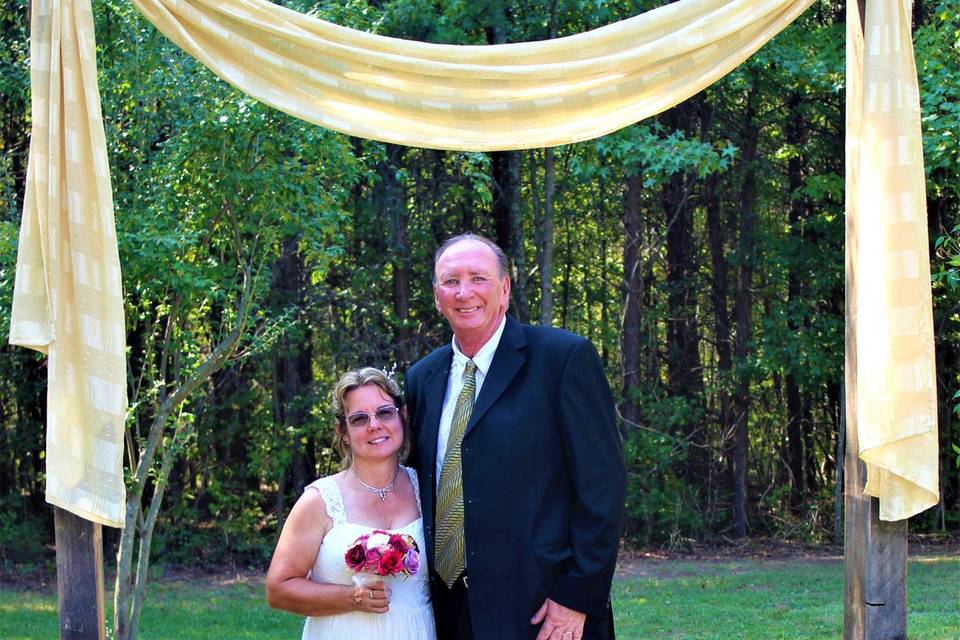 Newlyweds under the arch