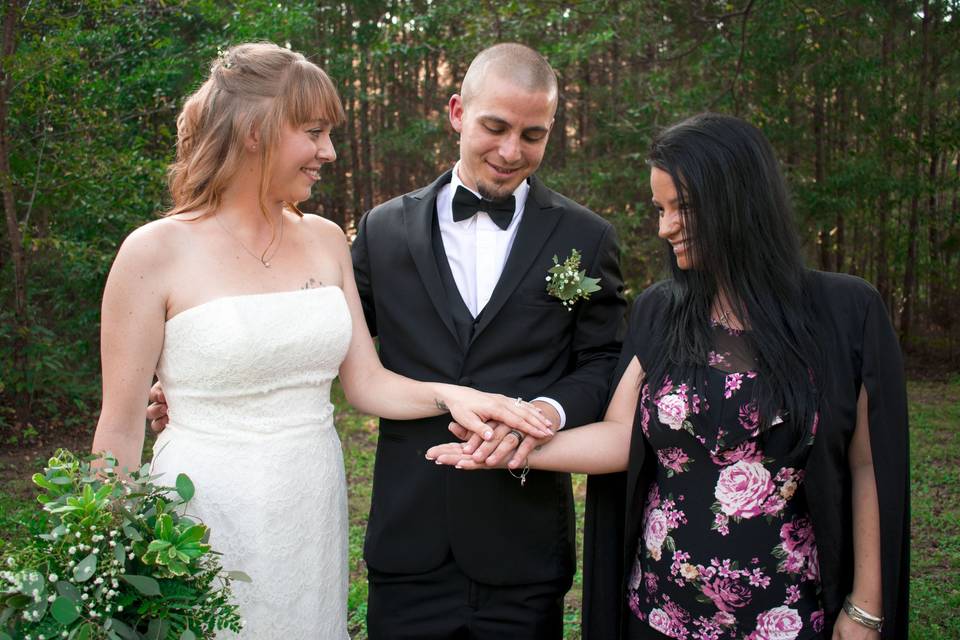 Bride, groom, and officiant