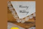 Invite your friends and family to your upcoming nuptials with the charming Yellow Daisy and Lace Wedding Invitation. Customize it with the personal names of the bride and groom and specific marriage ceremony details. Feel free to change the text, font or paper type to suit your needs. It is currently shown here on basic paper. This pretty shabby chic country wedding invite features a quaint floral photograph of a yellow daisy flower blossom, white pearl necklace, white bridal veil and lace trimmed off white cream colored linen handkerchief a weathered brown barn wood background. It is perfect for a casual yet classy rural country farm, rustic barn, ranch or western wedding theme.