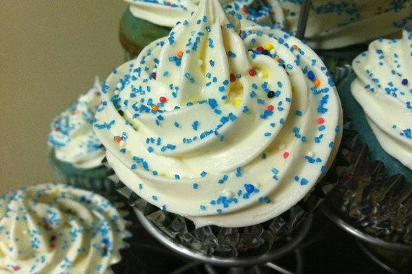 Vanilla Cake tinted Blue with Vanilla Frosting and Whipped Cream filling.
Birthday