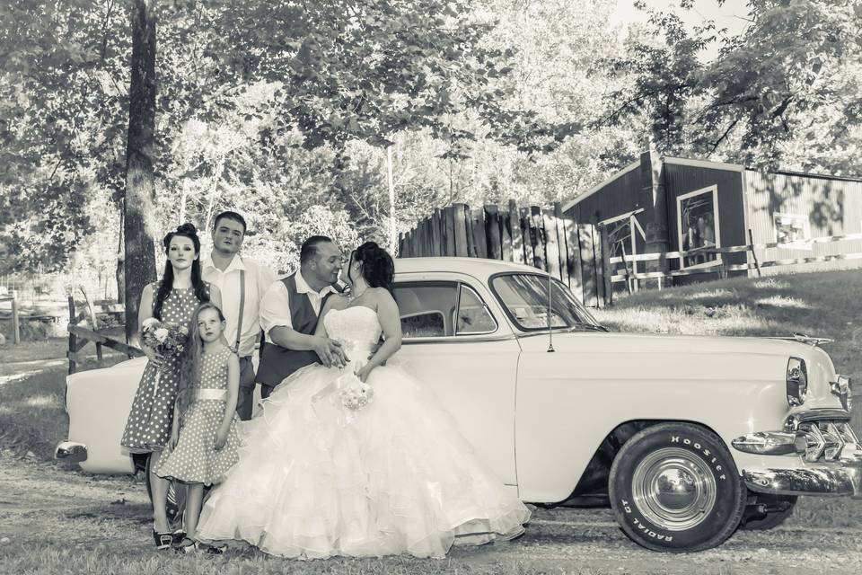 Couple with children. Photo by Crooked River Farm Photography LLC