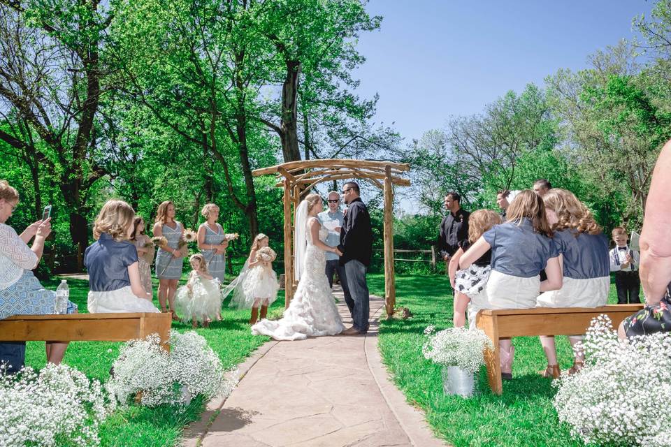 Spring Wedding ceremony.Photo by Crooked River Farm Photography LLC