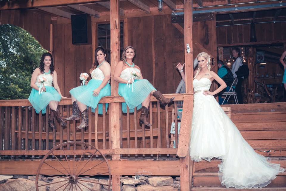 Bride with her bridesmaids.Photo by Crooked River Farm Photography LLC.