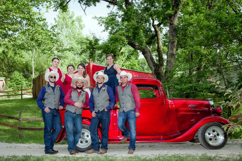 Wedding party with old truck. Photo by Crooked River Farm Photography LLC.