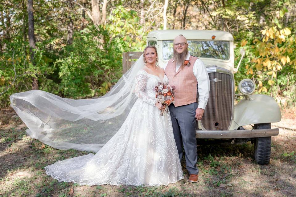 Couples with old truck