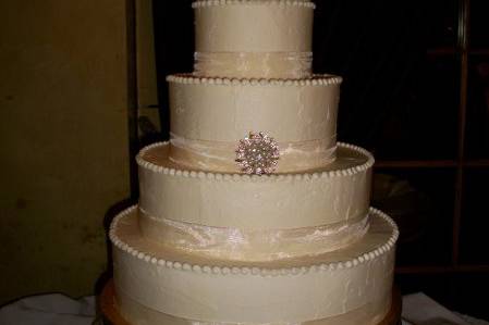 Three tier cake with pink flowers