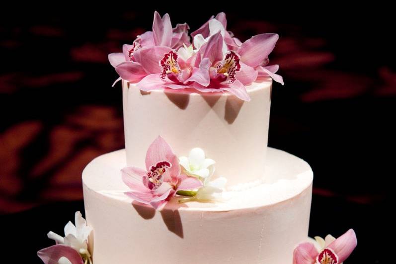 Three tier cake with pink flowers