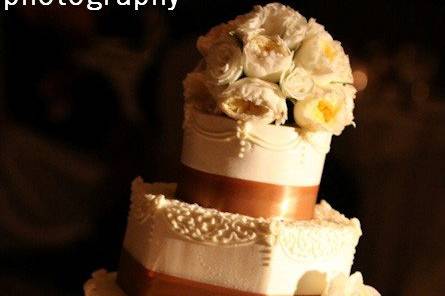 Four tier cake with pink flowers