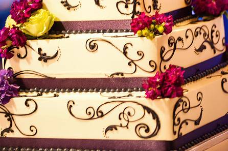 Four tier square cake with embellishments