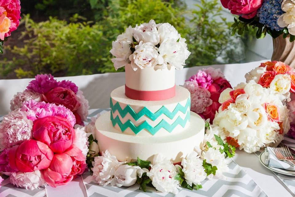 Three tier cake with pink flowers
