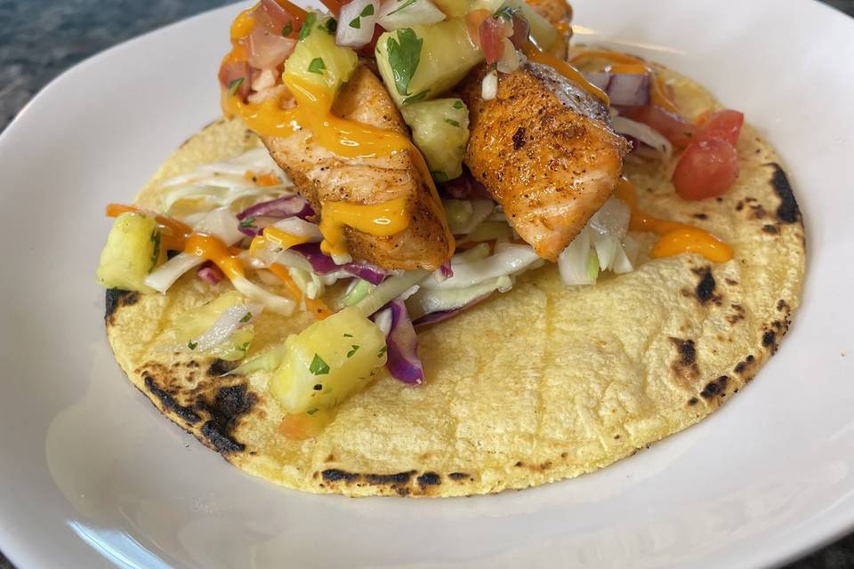 Salmon taco with pineapple pico