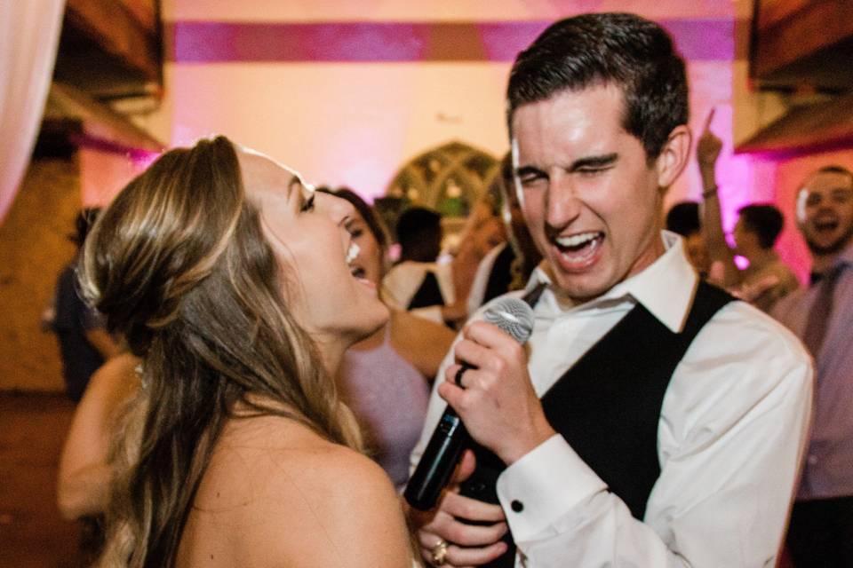 Bride and group singing