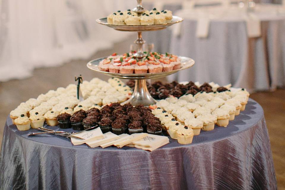 Coconut cake and lots of cupcakes