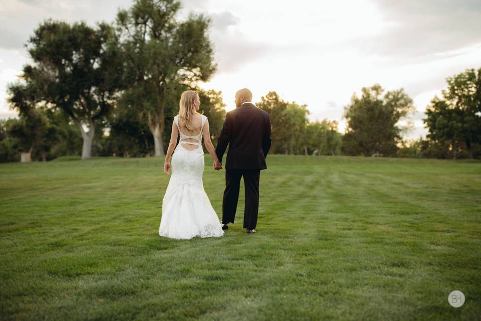 Newlyweds on a bridge