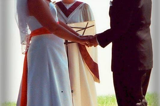The officiant conducting a wedding event