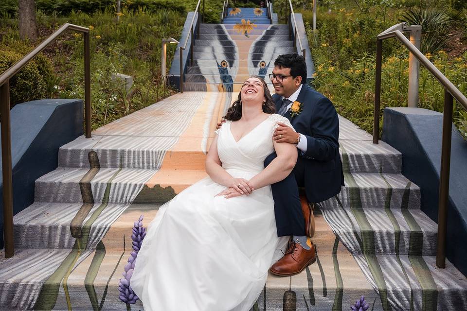 Couple at the mural stairs