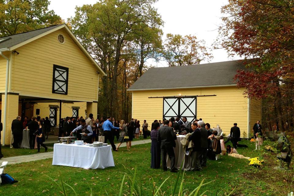 Cocktail hour in the barn complex courtyard