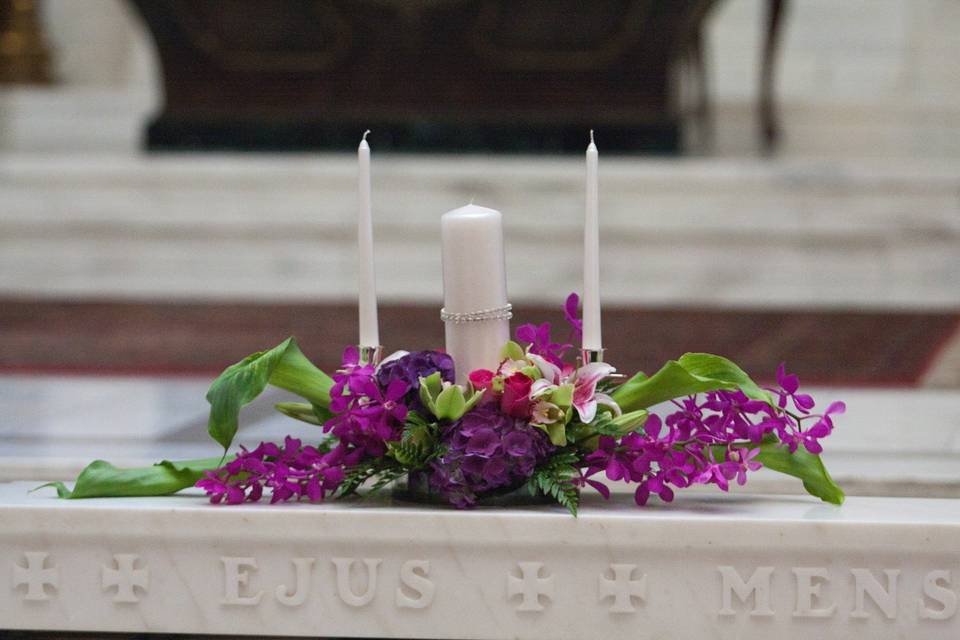 Candle and floral decoration