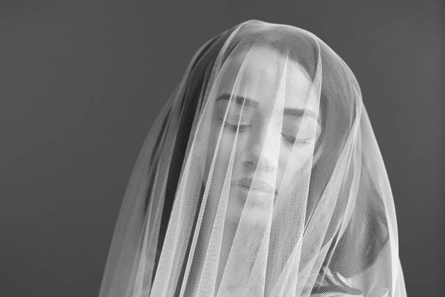 Behind the veil