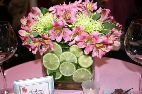 Pink and green centerpiece with limes