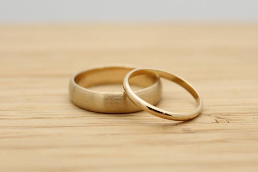 Classic half round bands in recycled yellow gold