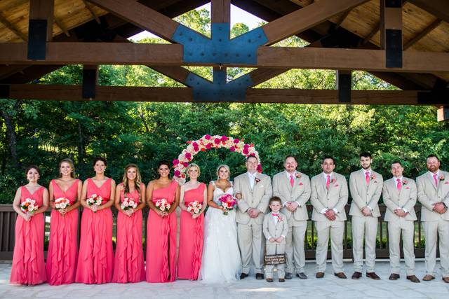 The couple with the bridesmaids and groomsmen