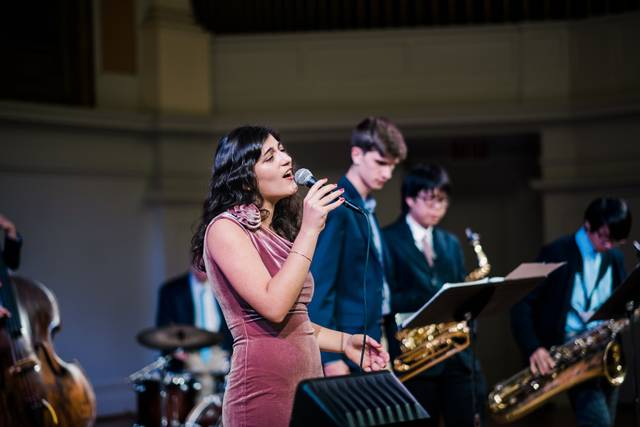 With the band